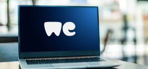 We Transfer laptop logo