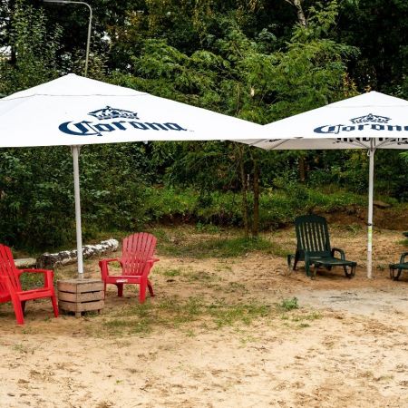 Parasol corona plastic stoelen terras